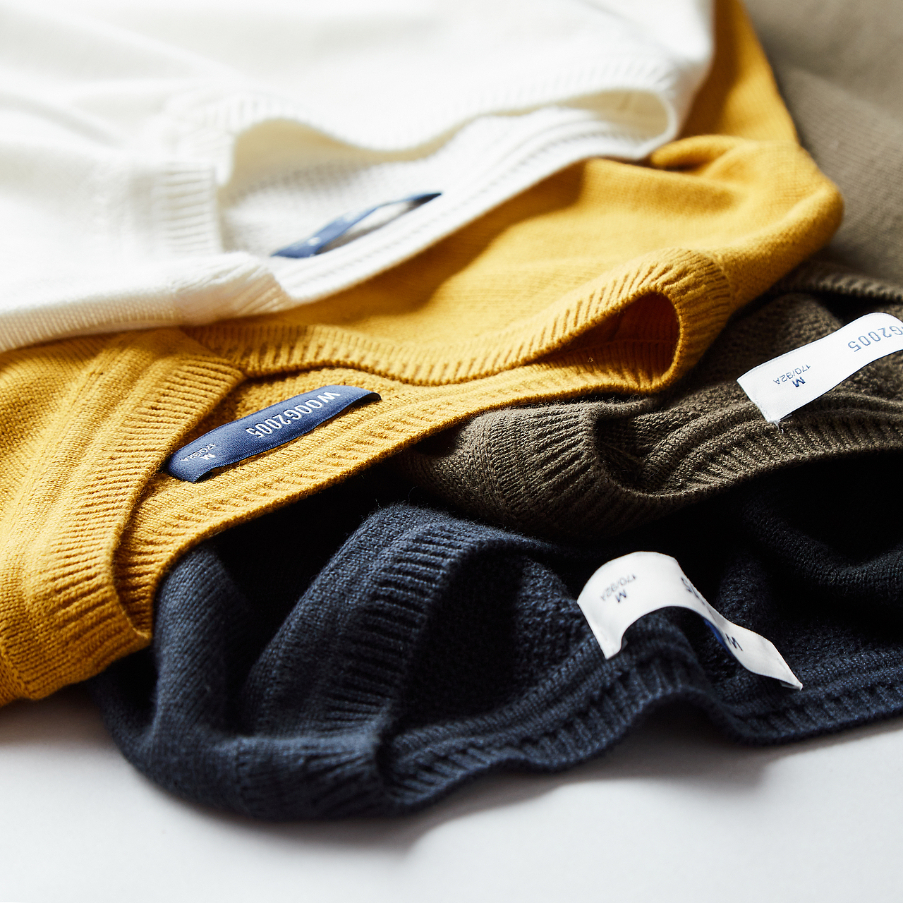 毛衣平铺拍摄 男装摆拍 创意组合图