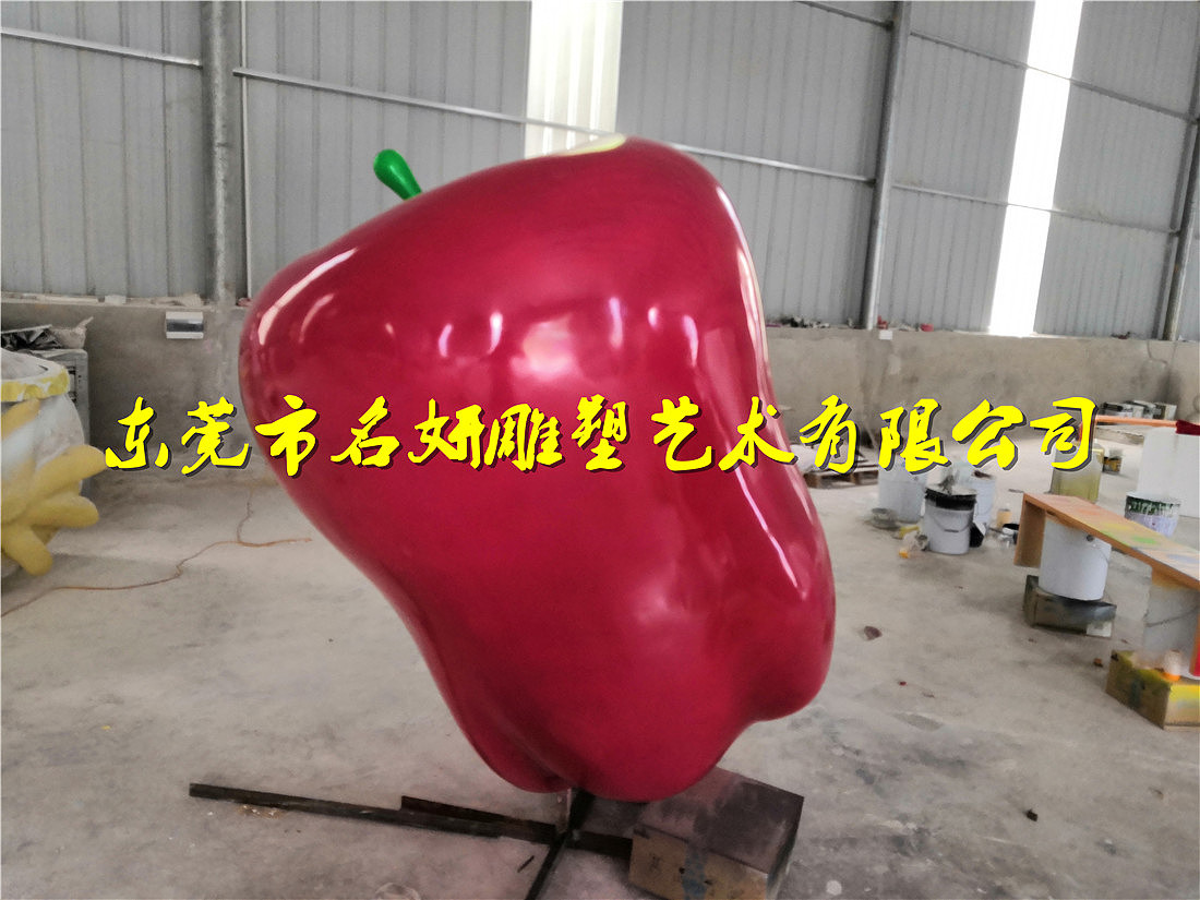 喀什瓜果之乡采用玻璃钢苹果石榴雕塑进行艺术振兴发展