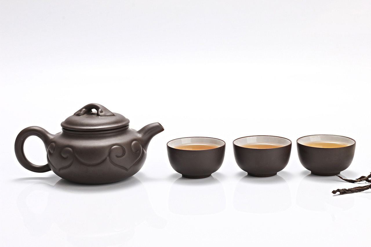 茶叶茶具-正山小种大红袍茶叶-紫砂壶-茶盘白背景拍摄