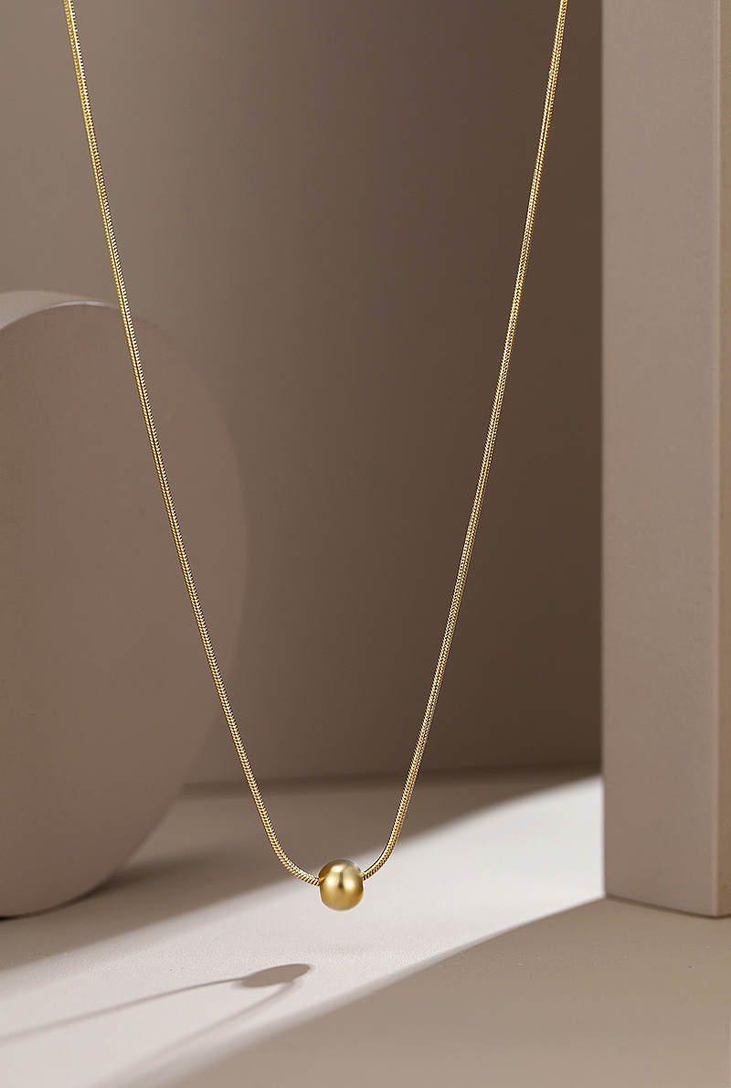 咖色背景时尚项链个性项链首饰摄影首饰场景