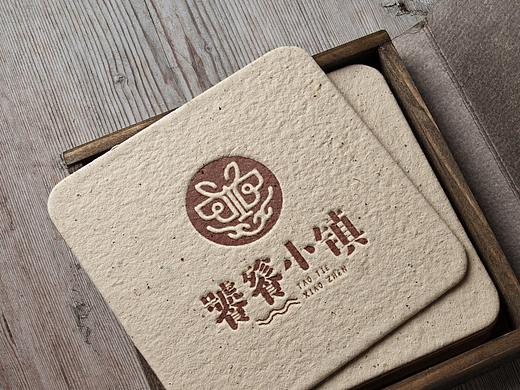 饕餮小镇logo