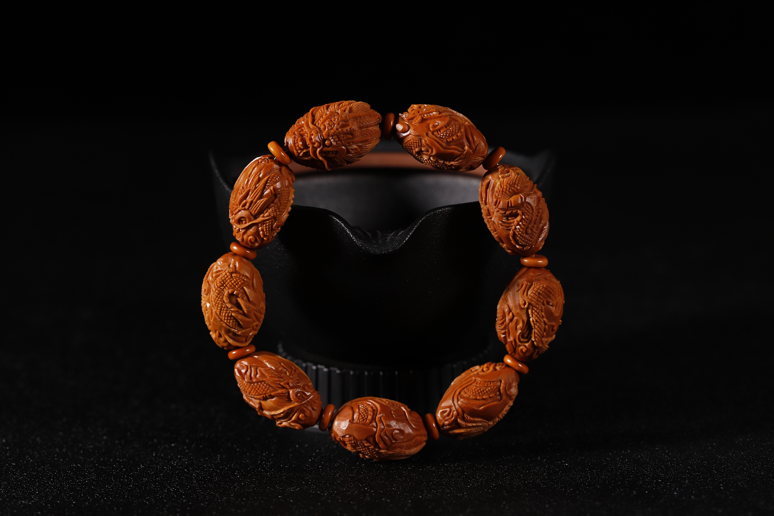 橄榄核雕手串摄影