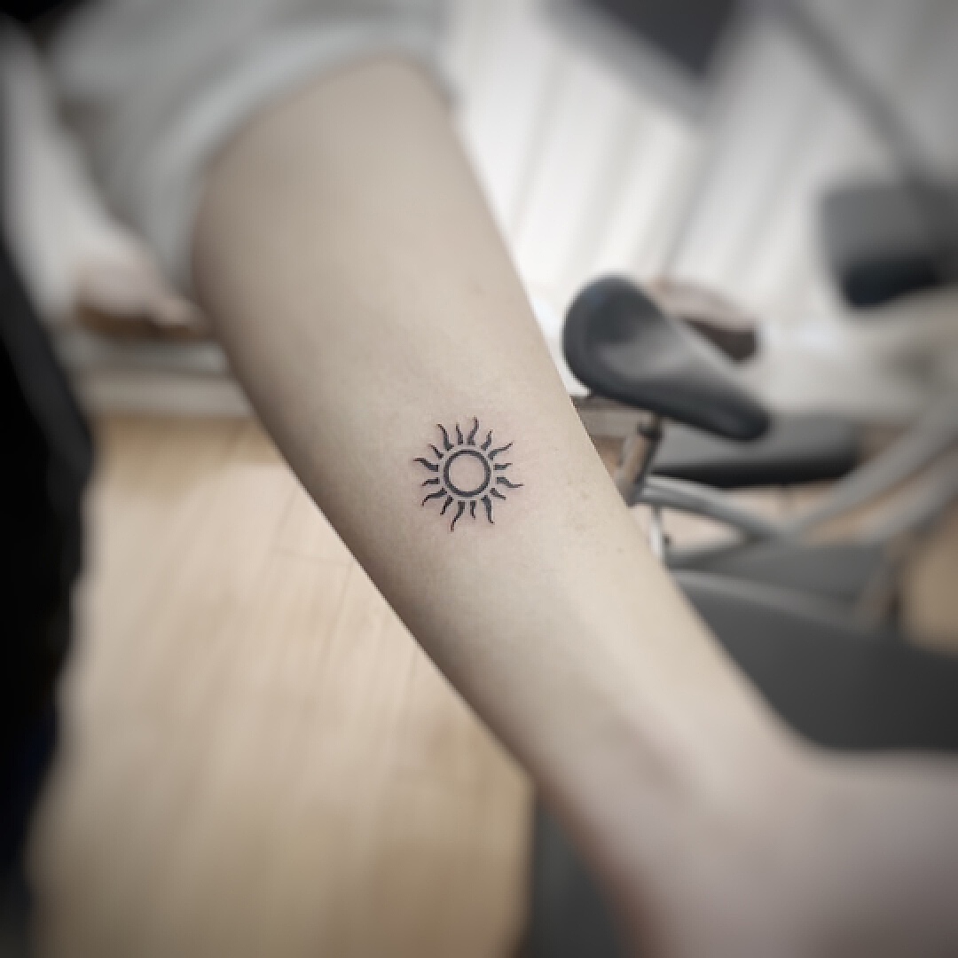 图腾纹身图案：图腾太阳纹身图案图片