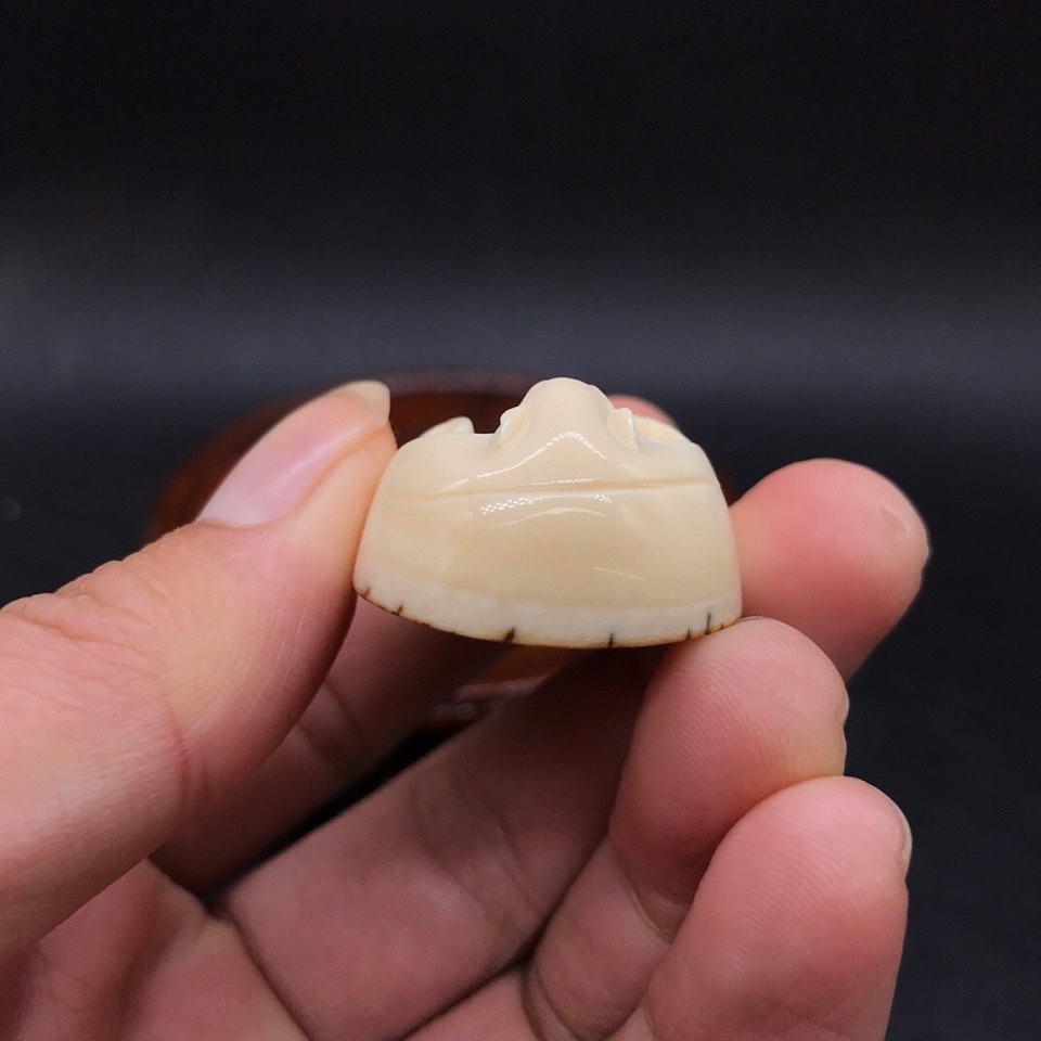 猛犸牙雕刻弥勒佛吊坠牌子欣赏