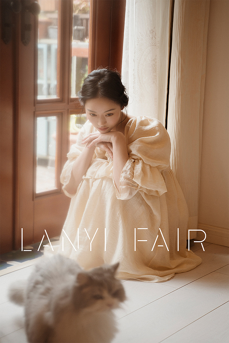 米黄色钉珠吊穗两件套连衣裙