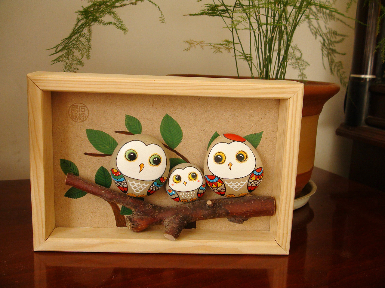 手绘鹅卵石猫头鹰石头画