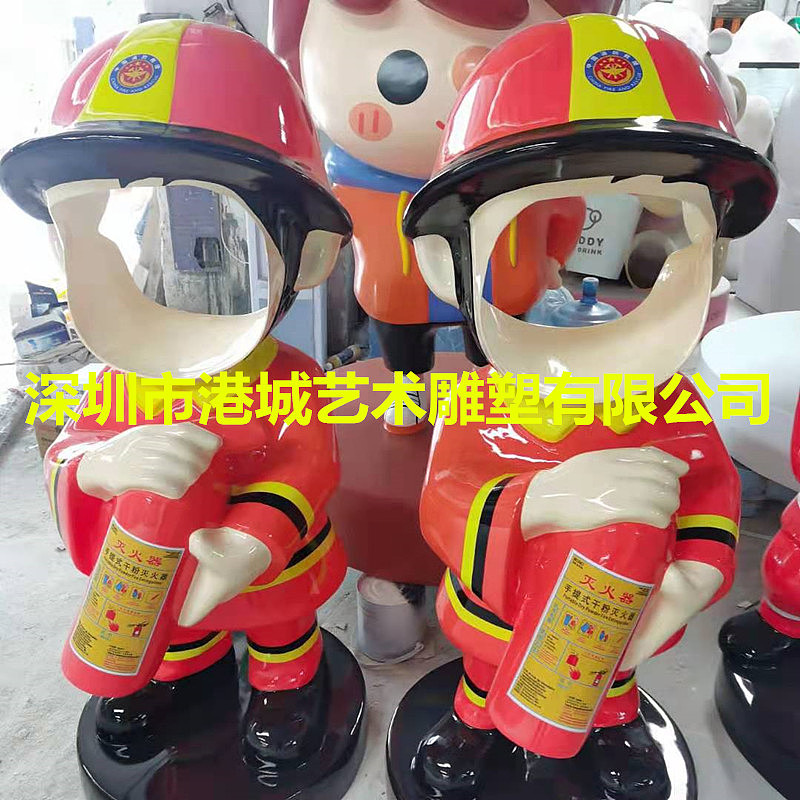 网红商业街打卡点合拍镂空玻璃钢消防员卡通公仔雕塑厂