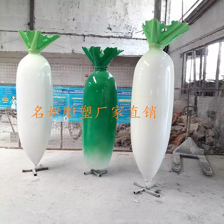 一层又一层的“绿色衣服”是玻璃钢圆包菜雕塑的叶子哦