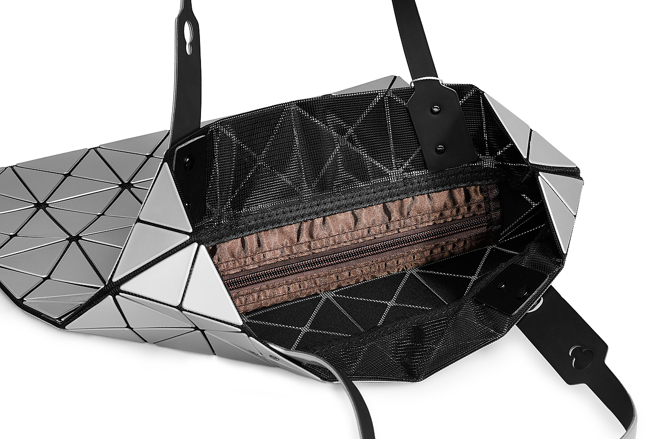 一个包，有科技感吗，背景花花的（图ZMzEwMTAxNjY0） - 产品摄影 - 站酷设计师猪可乐原创素材 - 站酷ZCOOL