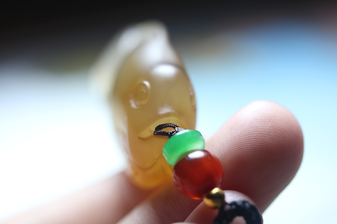 九张23.6.15马料黑色巧雕年年有余