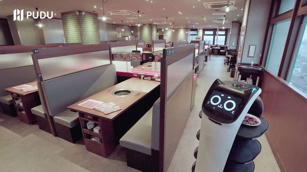 普渡科技配送机器人|迎宾机器人上岗和民烤肉店