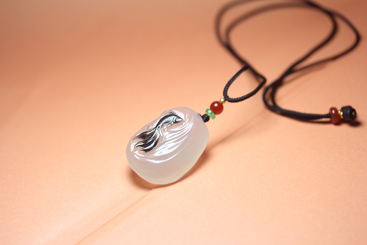 九张23.6.15马料黑色巧雕年年有余