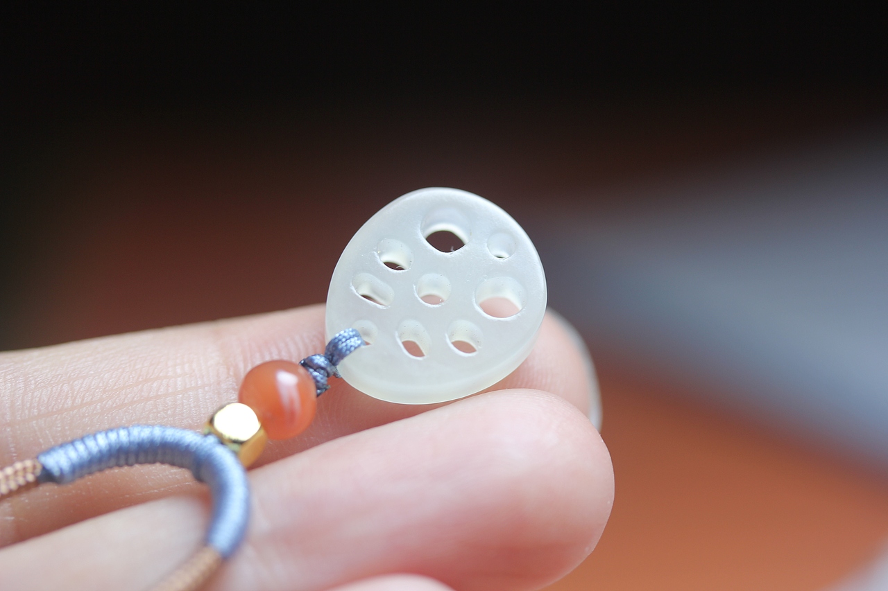 九张23.6.15马料黑色巧雕年年有余