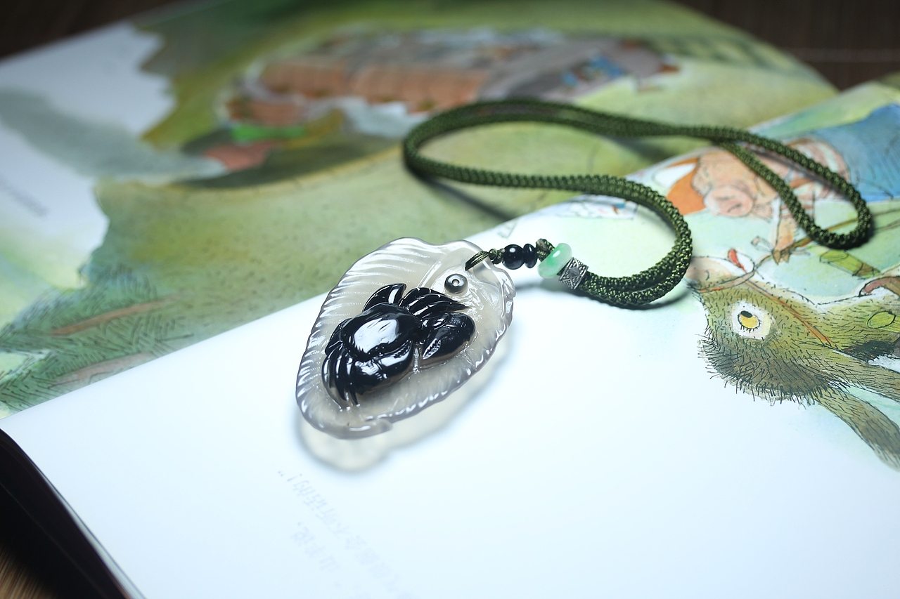 九张23.6.15马料黑色巧雕年年有余