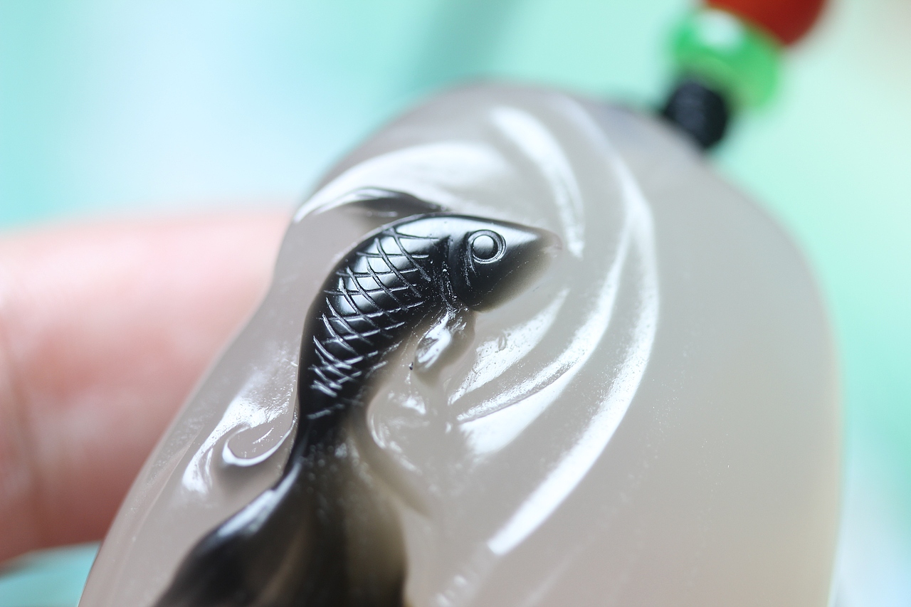 九张23.6.15马料黑色巧雕年年有余