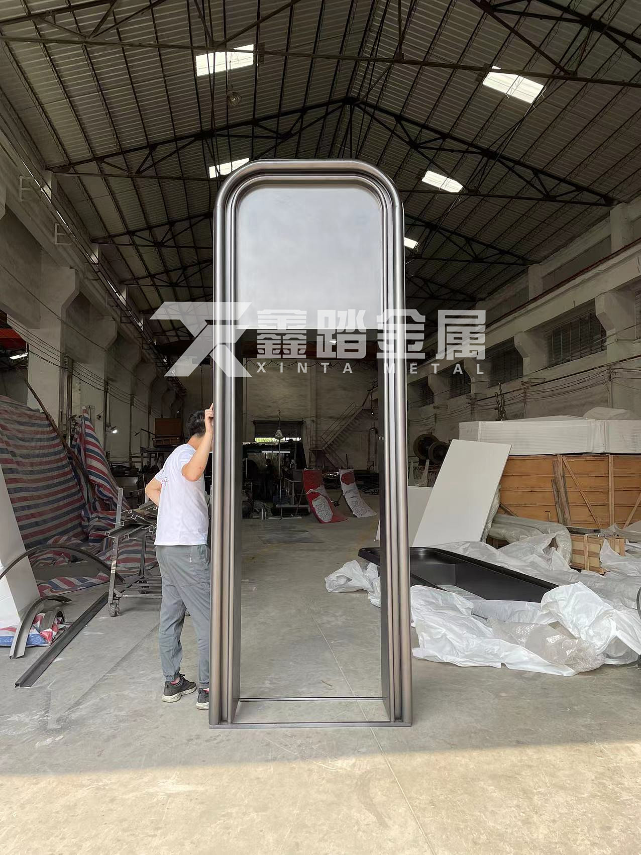 双曲异形不锈钢门套 手工锻造弧形门桃实物图