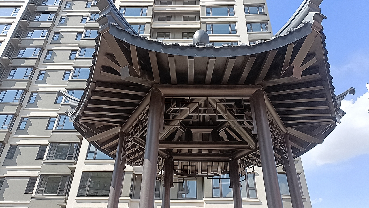 小区景观钢结构六角凉亭拉丝古铜金属廊架凉亭工程案例