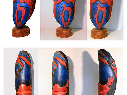 题目为《魅》的圆雕和《艮》蜡染手工艺