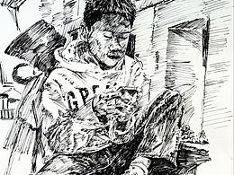 玩手机的男孩