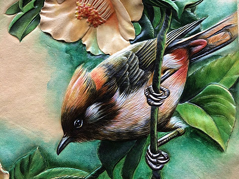 皮雕花鸟手包
