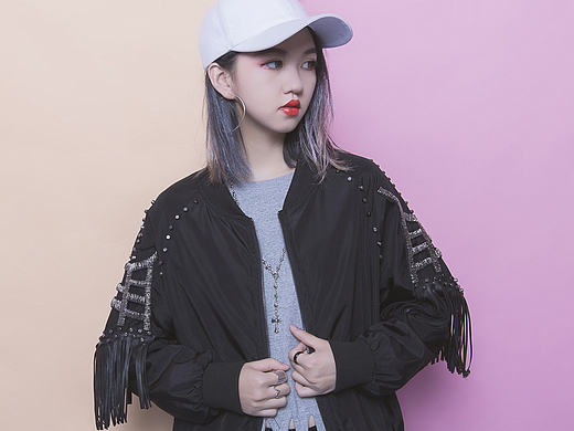 XXX个性铆钉流苏拼接外套
