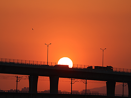 风景日落沙滩海摄影大桥景色夕阳落日下午太阳光线黄昏