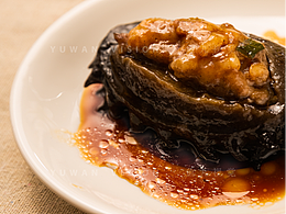 美食与艺术的完美结合:摄影师拍摄酿海参的照片