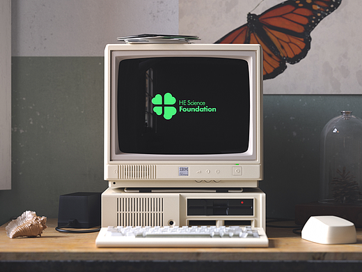 何享健科学logo|Slogan--“迎风而立,阳光万里”