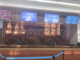 大堂紫铜浮雕《帝后礼佛图》亮相龙门石窟售票大厅