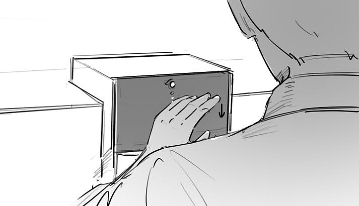 镜头切到男士左肩,一只手从上向下扫过面板