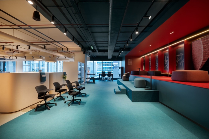办公楼装修：色彩流动分区术 定义协作与专注的呼吸感