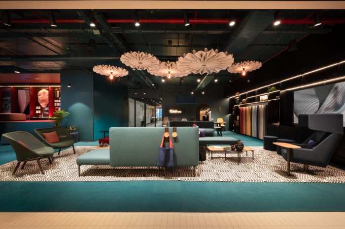 办公楼装修：色彩流动分区术 定义协作与专注的呼吸感