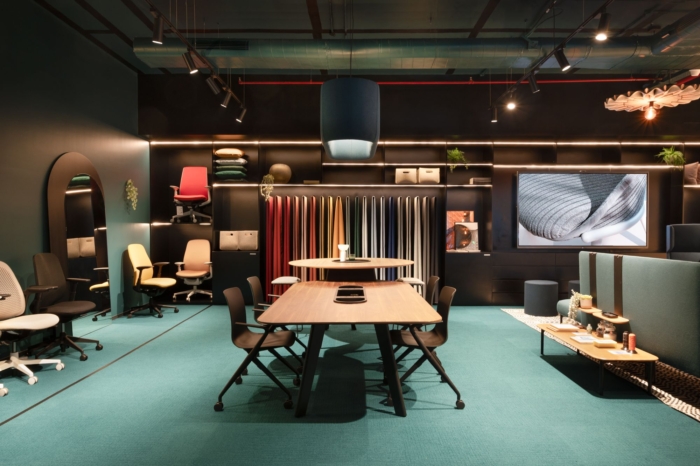 办公楼装修：色彩流动分区术 定义协作与专注的呼吸感
