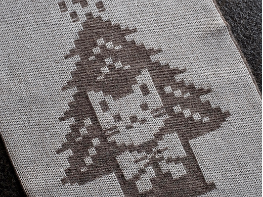 用织布机织小猫和树