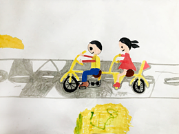 两个骑单车的小孩