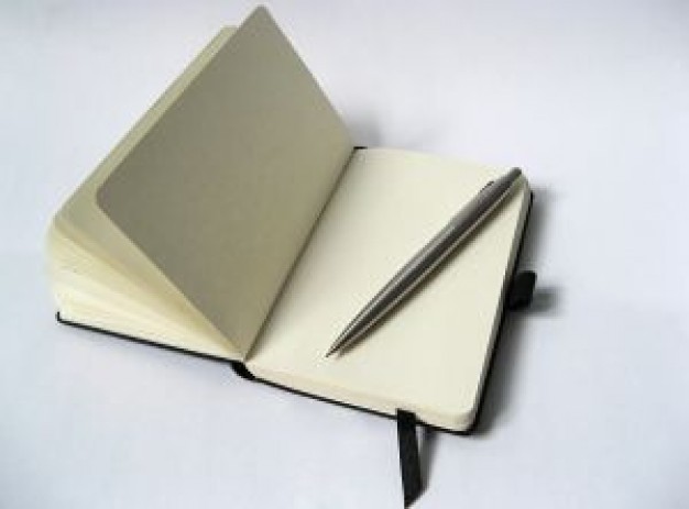 black notebook with pencil